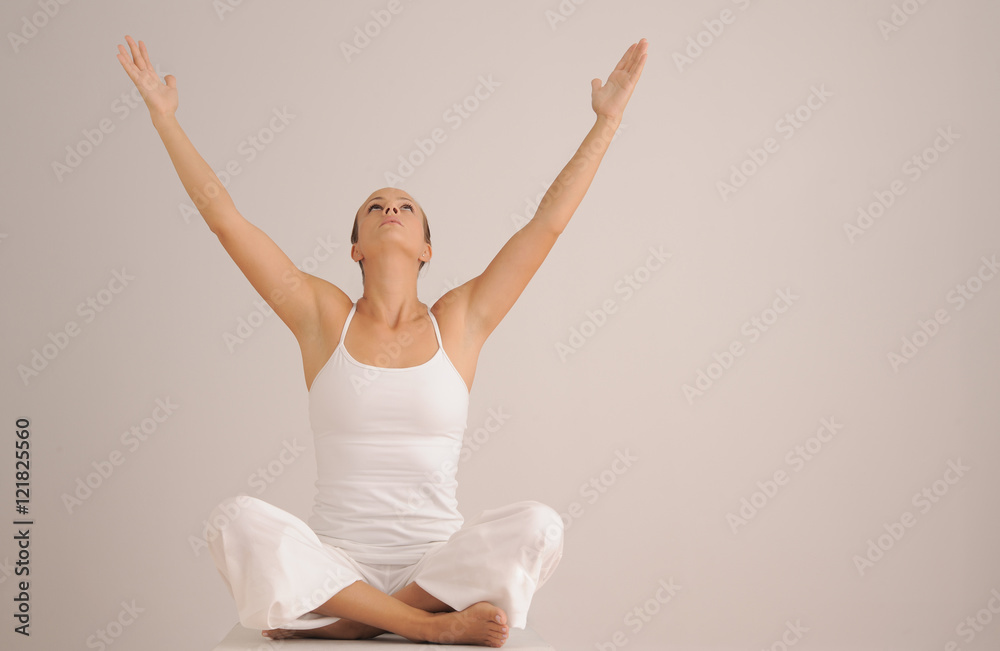 Certified Yoga Instructor Demonstrating Poses in Studio Certified Yoga Instructor Demonstrating Poses in Studio