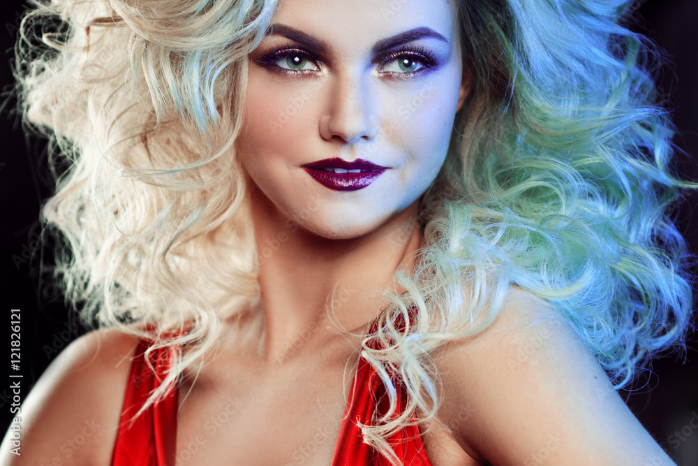 Fashion photo of young magnificent woman with luxurious styling. Studio portrait Fashion photo of young magnificent woman with luxurious styling. Studio portrait