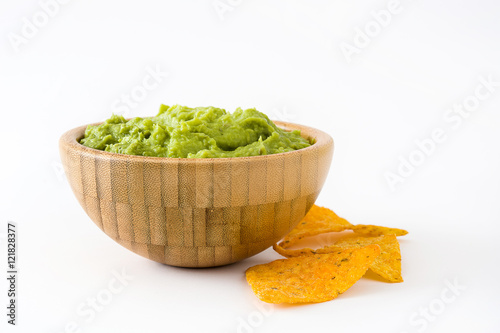 Nachos and guacamole in bowls isolated on white background

