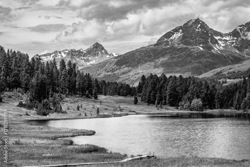 Alpine landscape with mountain lake in black and white fine-art