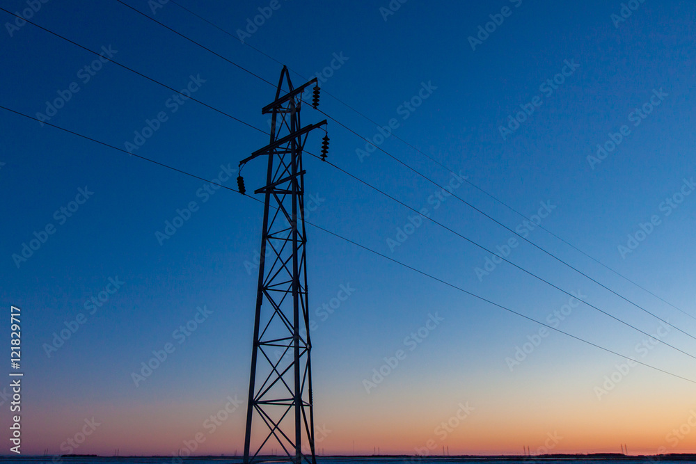 SIngle Transmission Tower against Prairie Sunset