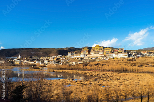 Songzanlin Tibetan Buddhist Monastery and Lamuyangcuo Lake located at Shangri-La (Zhongdian), Yunnan, China.