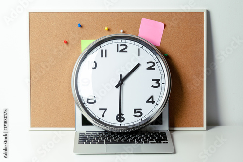 Clock at an office table