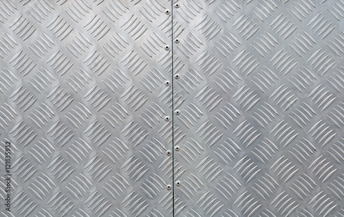 metal texture, shiny aluminum background with diagonal relief part