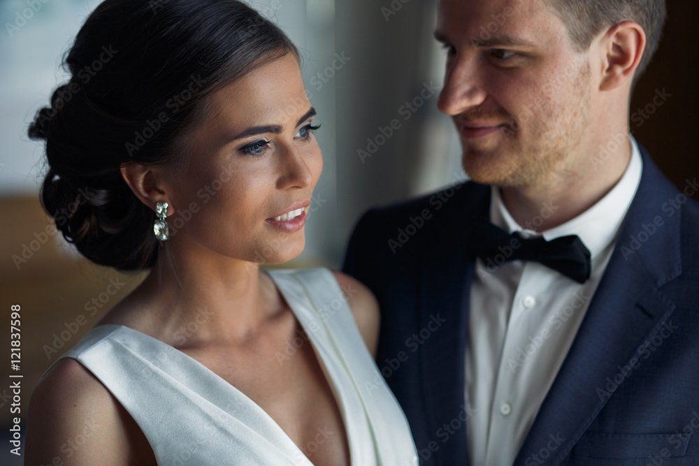 The happinest groom look at his bride The happinest groom look at his bride