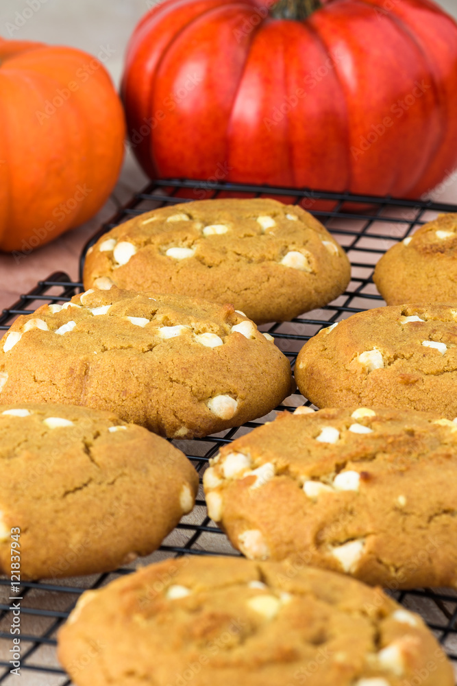 Pumpkin cookies with cream cheese chips.