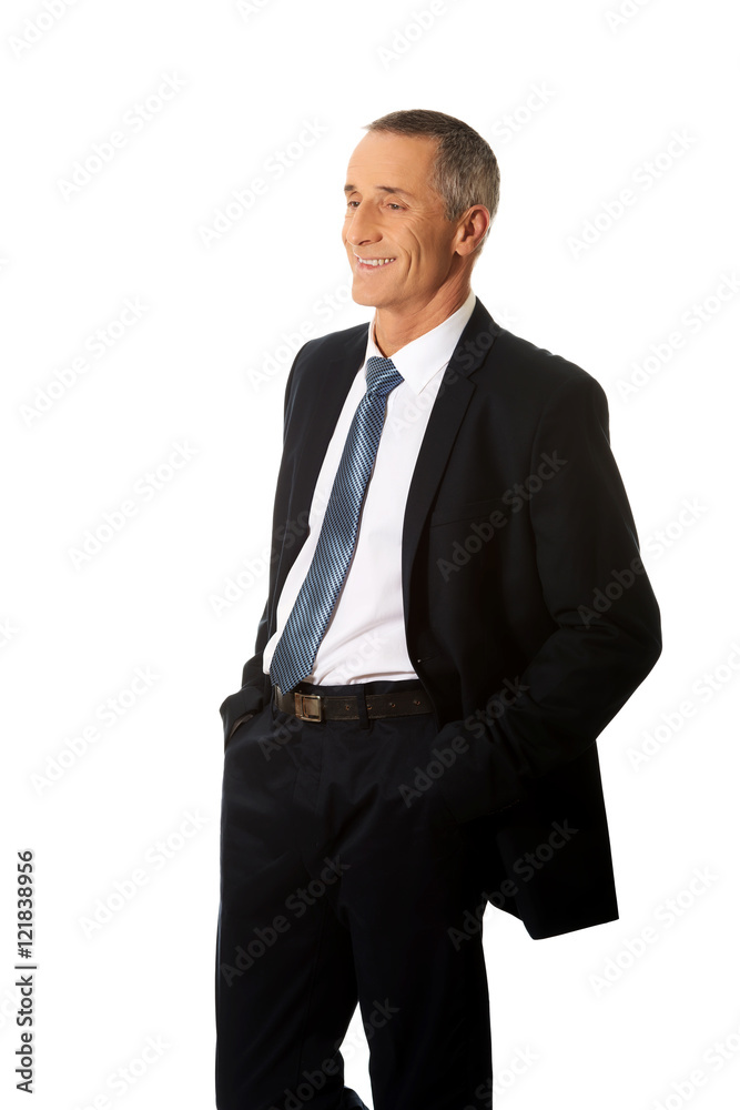 Businessman with hands in pockets Businessman with hands in pockets