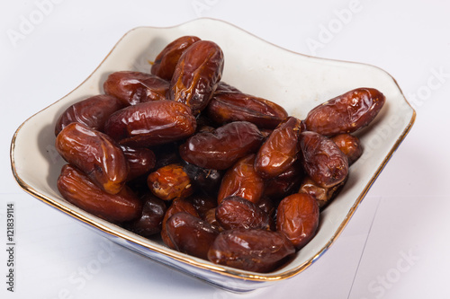 dried dates in white piala