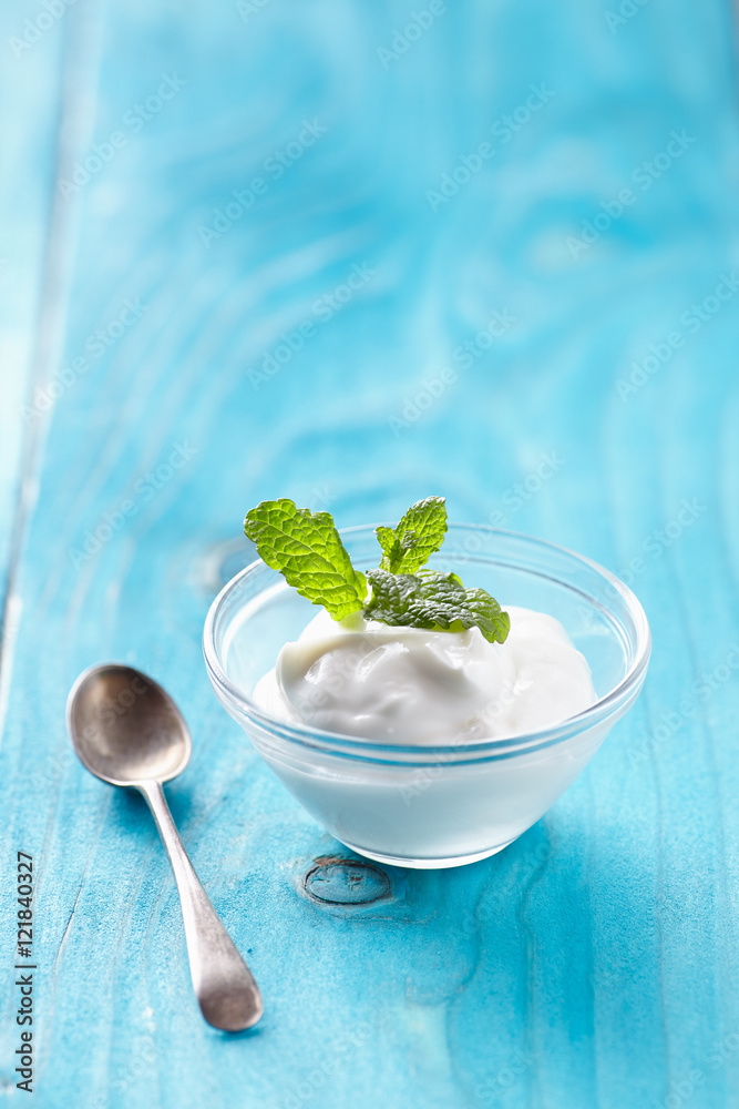 greek yogurt on blu table