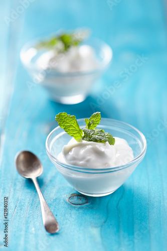 greek yogurt on blu table photo