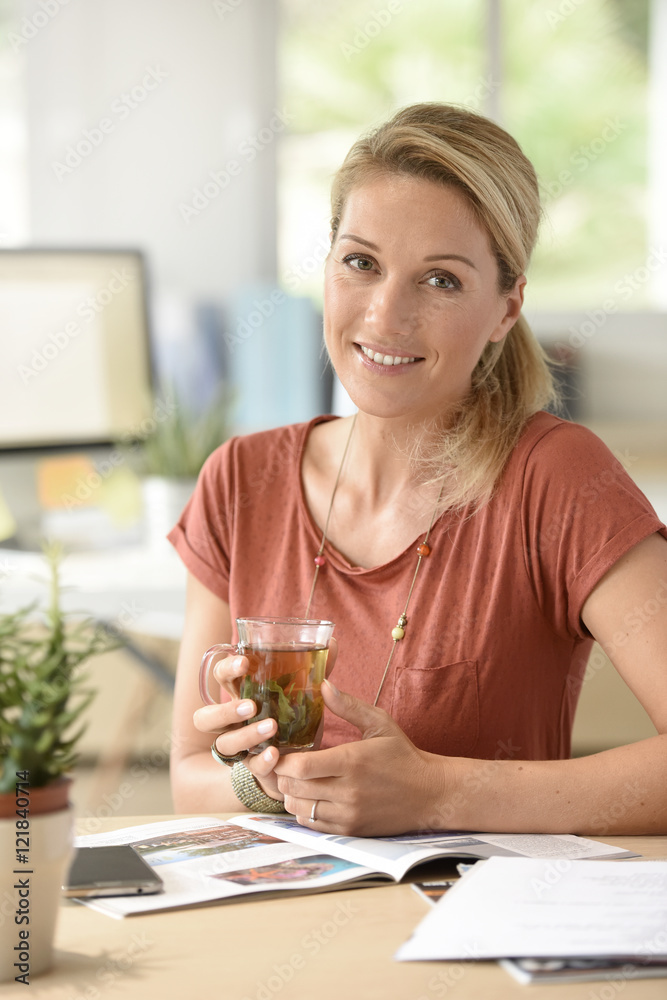 Attractive woman designer working from home-office Attractive woman designer working from home-office