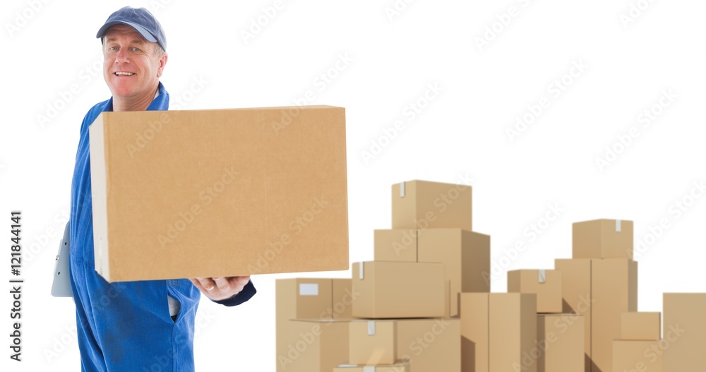 Composite image of happy delivery man showing cardboard box Composite image of happy delivery man showing cardboard box