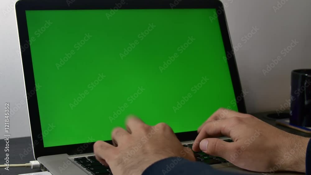 Young Man Writing On His Laptop An E-Mail, Green Screen, Side Shot
Young Man Writing On His Laptop An E-Mail, Green Screen, Side Shot