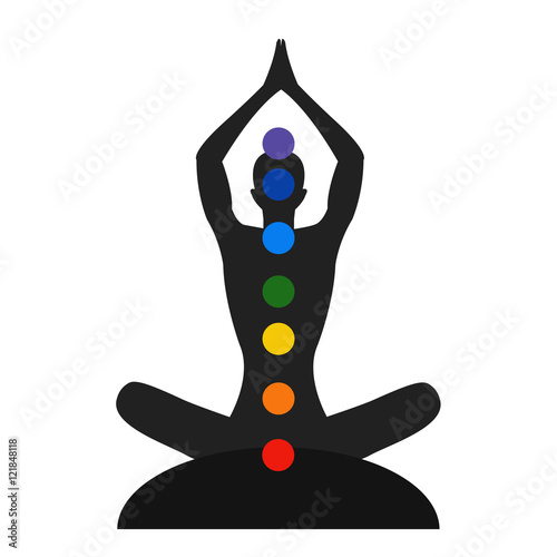 Silhouette of the meditate person with color the chakras, yoga person