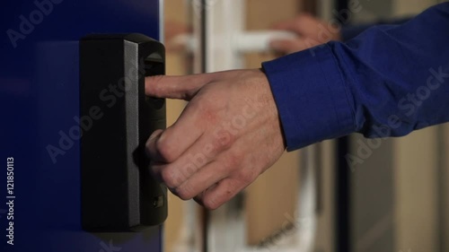 The door with the fingerprint scanner