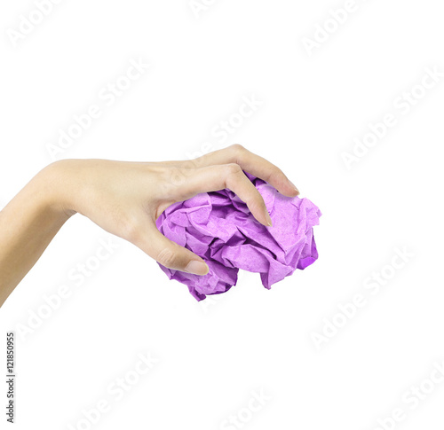 Closeup action of woman hand catching purple crumpled paper in hand isolated on white background with clipping path