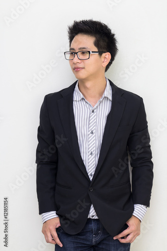 Portrait of a smart asian confident businessman © oyoo