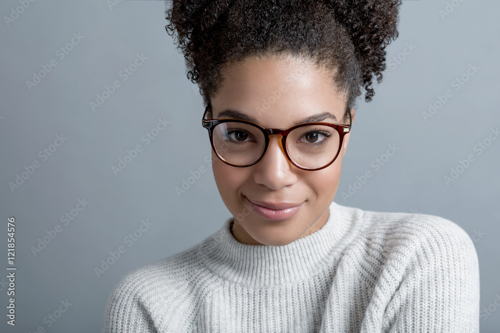 Young modern woman with glasses wearing a warm sweater Young modern woman with glasses wearing a warm sweater