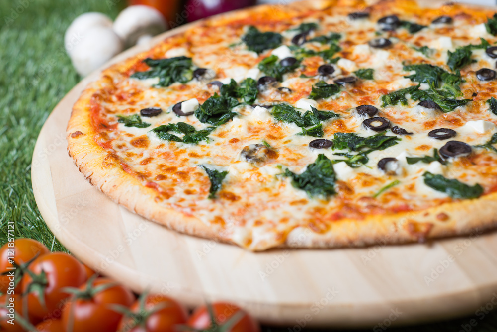 Delicious pizza which you can eat even on a diet. Only high quality and low fat products like spinach and feta cheese.