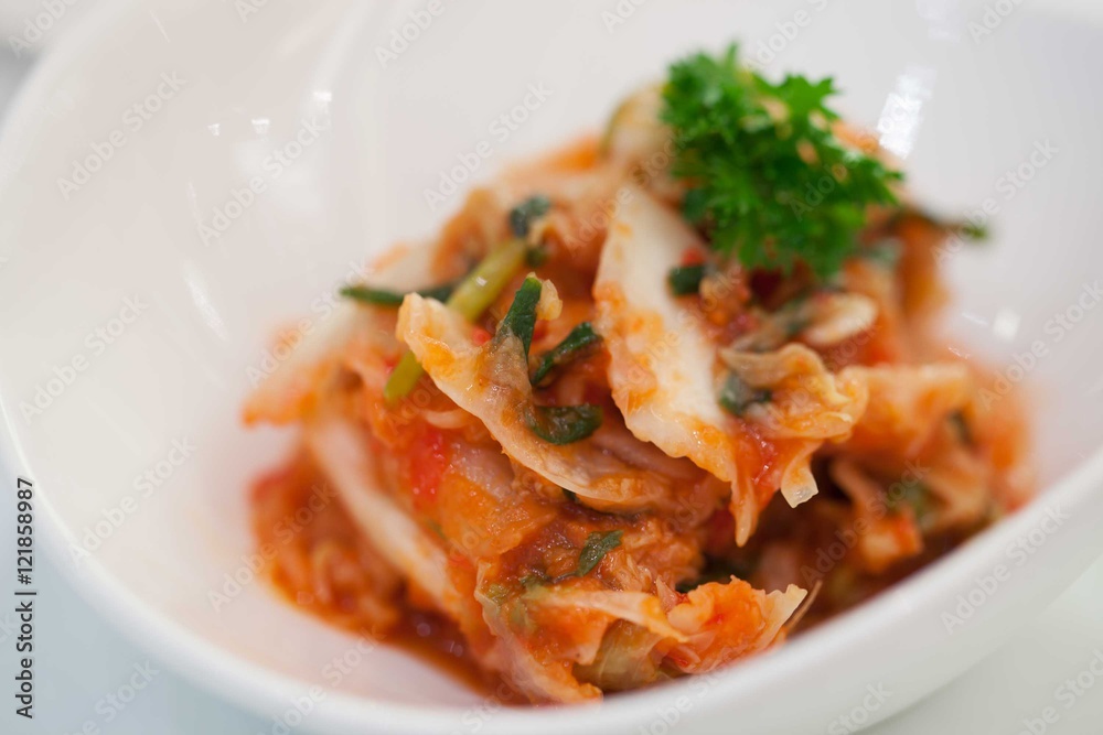 Kimchi (Korean food) close up on white background Kimchi (Korean food) close up on white background