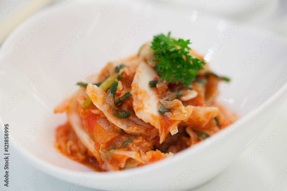 Kimchi (Korean food) close up on white background Kimchi (Korean food) close up on white background