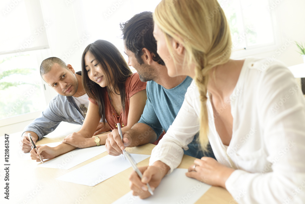Group of young ethnic business people in meeting Group of young ethnic business people in meeting