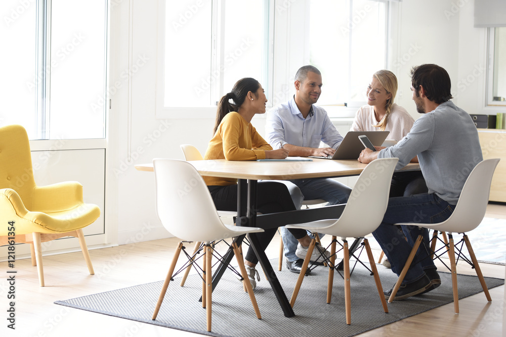 Business people meeting around table in office