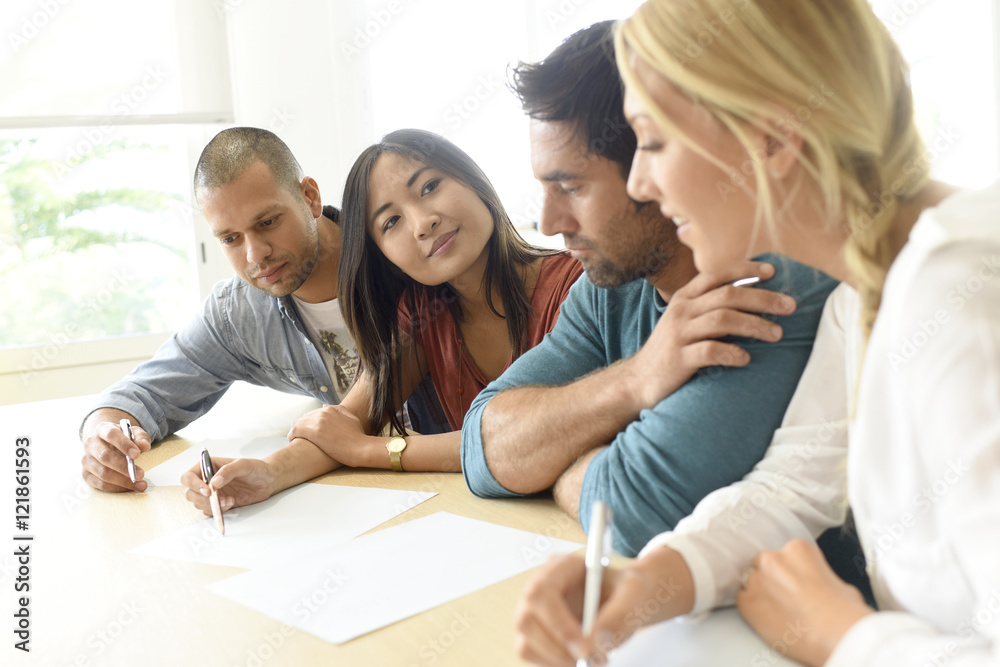 Group of young ethnic business people in meeting Group of young ethnic business people in meeting