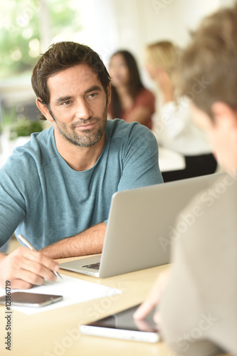 Businessman in office meeting with client