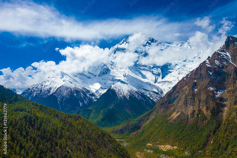 Landscape Snow Mountains Nature Viewpoint.Mountain Trekking Landscapes Background. Nobody photo.Asia Travel Horizontal picture. Sunlights White Clouds Blue Sky. Himalayas Rocks.