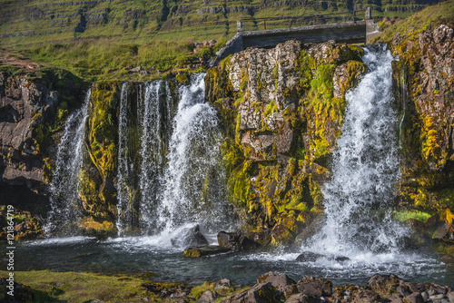 Wonderful waterfal Kirkjufellsfossl in Iceland in Autumn colors