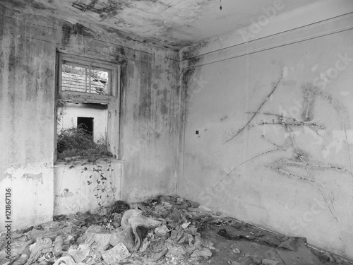 Old abandoned house interior in black and white colors