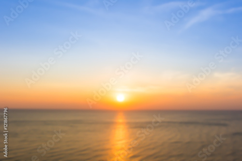 Blur image of a Beautiful morning sun light in sky background.