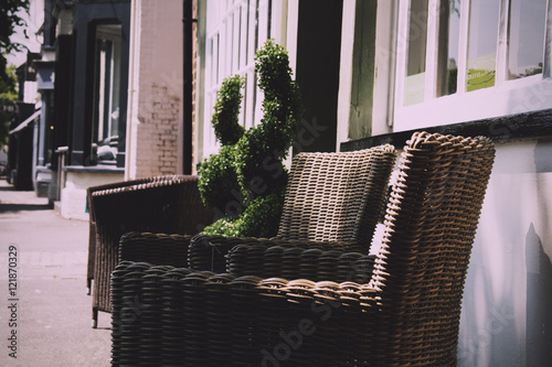 BEACONSFIELD, ENGLAND - JUNE 2016: Chairs for sale outside a sho photo