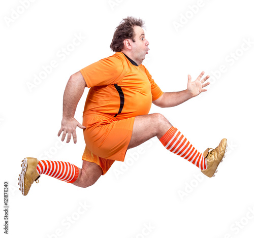 Fotografie recreational footballer running isolated on a white background