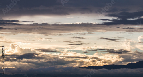 colorful dramatic sky with cloud at sunset