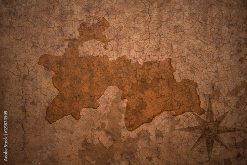 tajikistan map on vintage crack paper background