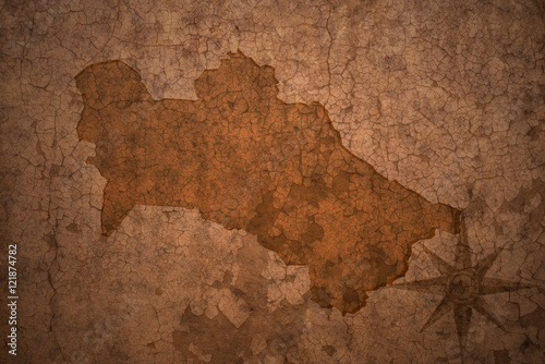turkmenistan map on vintage crack paper background