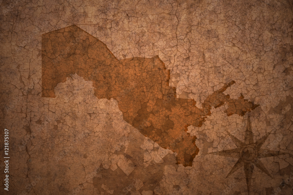 uzbekistan map on vintage crack paper background