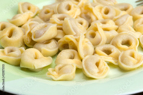 Tortellini are ring-shaped pasta or "navel shaped"