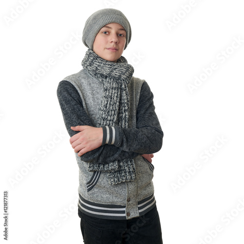 Cute teenager boy in gray sweater over white isolated background