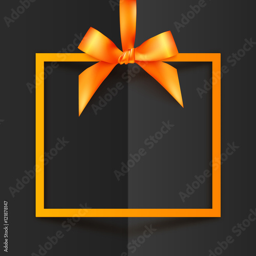 Orange vector gift box frame with silky bow and ribbon on black folded paper background