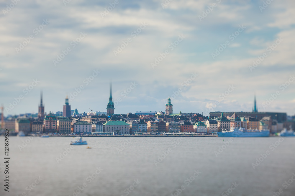 Beautiful super wide-angle panoramic aerial view of Stockholm, Sweden with harbor and skyline with scenery beyond the city, seen from the observation tower, sunny summer day with blue sky
