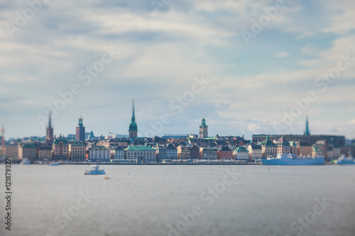 Beautiful super wide-angle panoramic aerial view of Stockholm, Sweden with harbor and skyline with scenery beyond the city, seen from the observation tower, sunny summer day with blue sky 