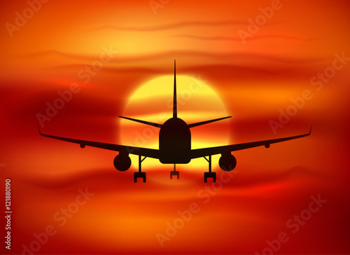 Black vector plane silhouette at red sunset background