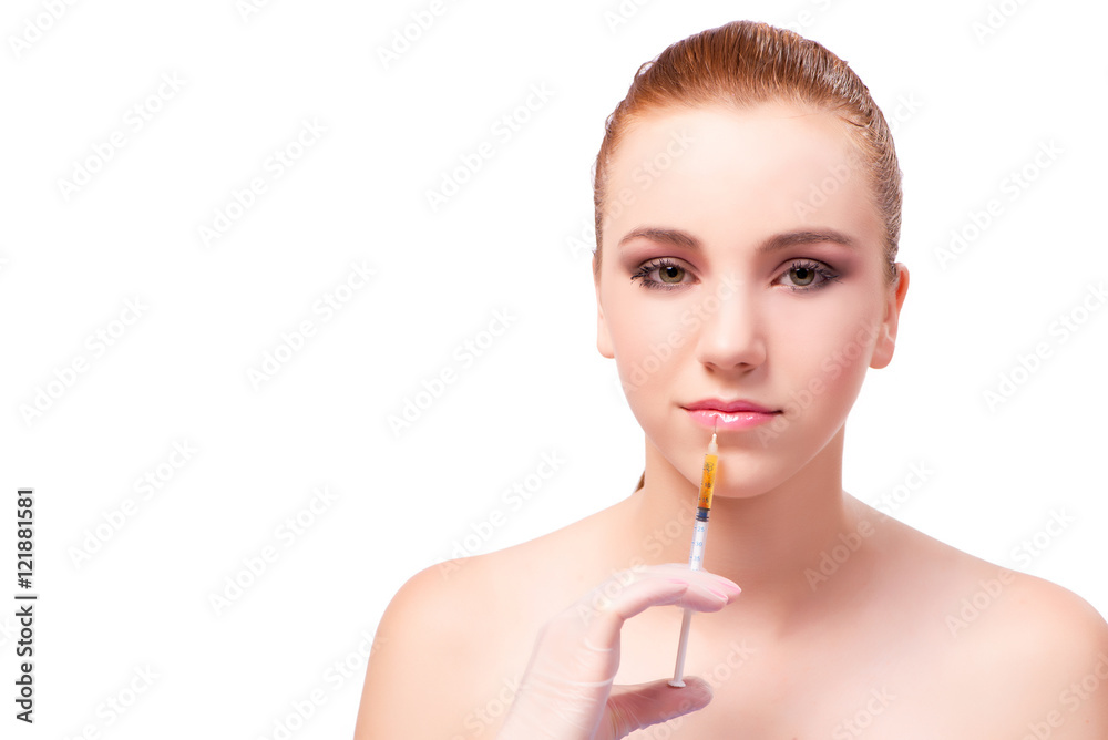 Young woman preparing for facial treatment isolated on white Young woman preparing for facial treatment isolated on white