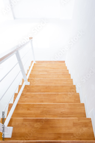 The modern wooden stair way in home close up.