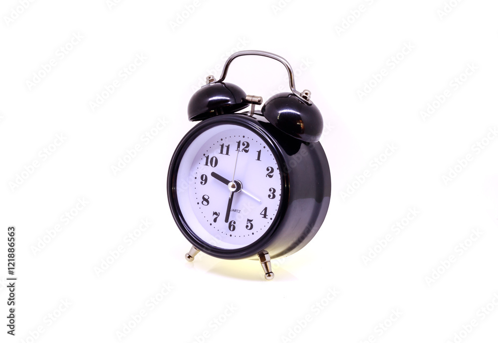 Black alarm clock isolated on white background.