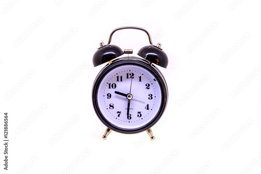 Black alarm clock isolated on white background. Black alarm clock isolated on white background.