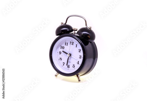 Obraz na płótnie Black alarm clock isolated on white background. w salonie